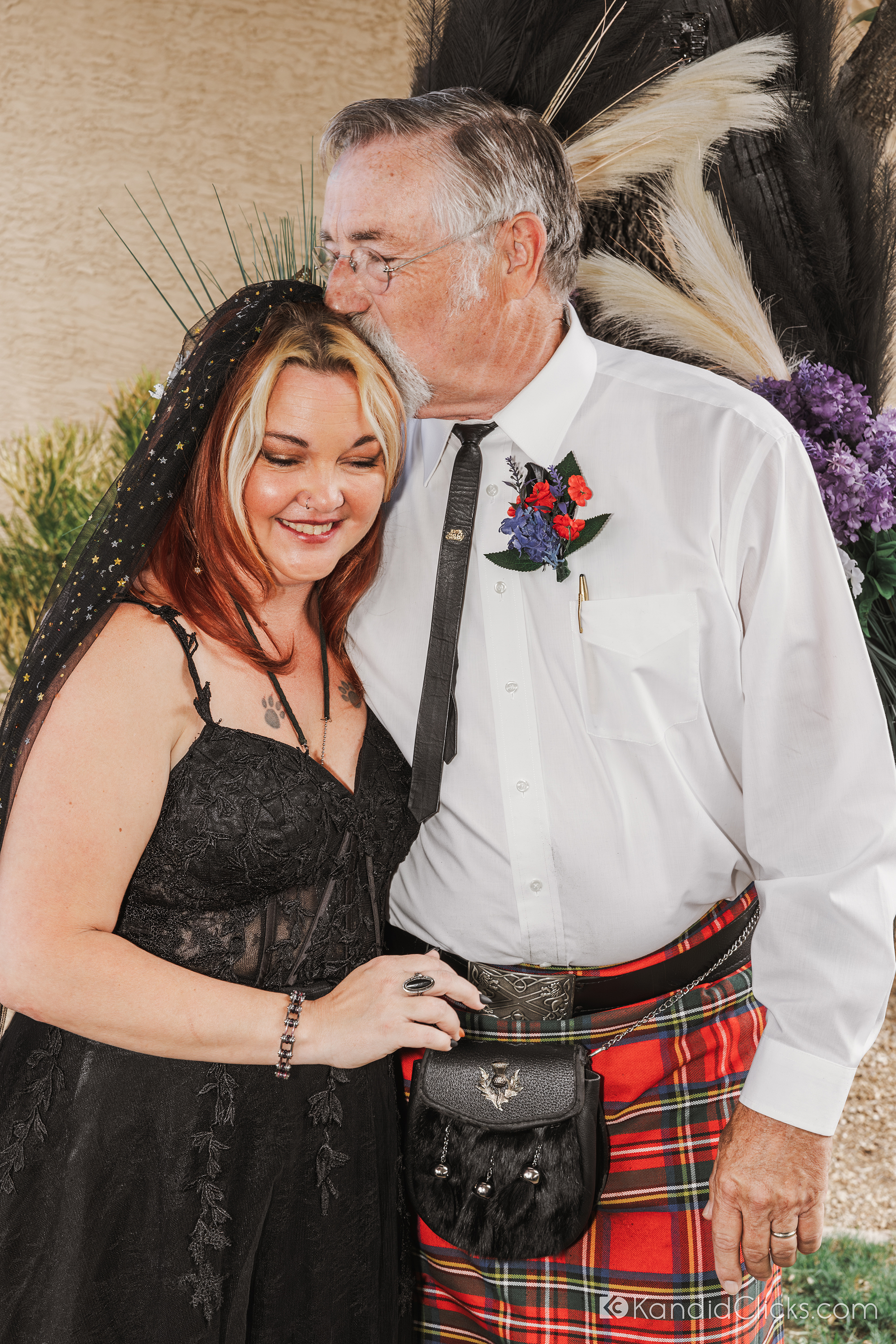 Bride shares an emotional moment with her father on the wedding day.