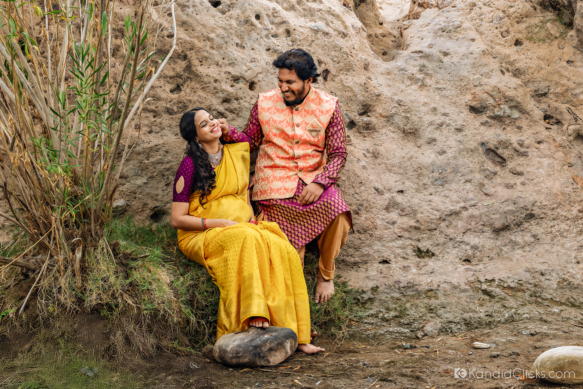 Maternity photographer captures playful couple laughing together outdoors during cultural photo session