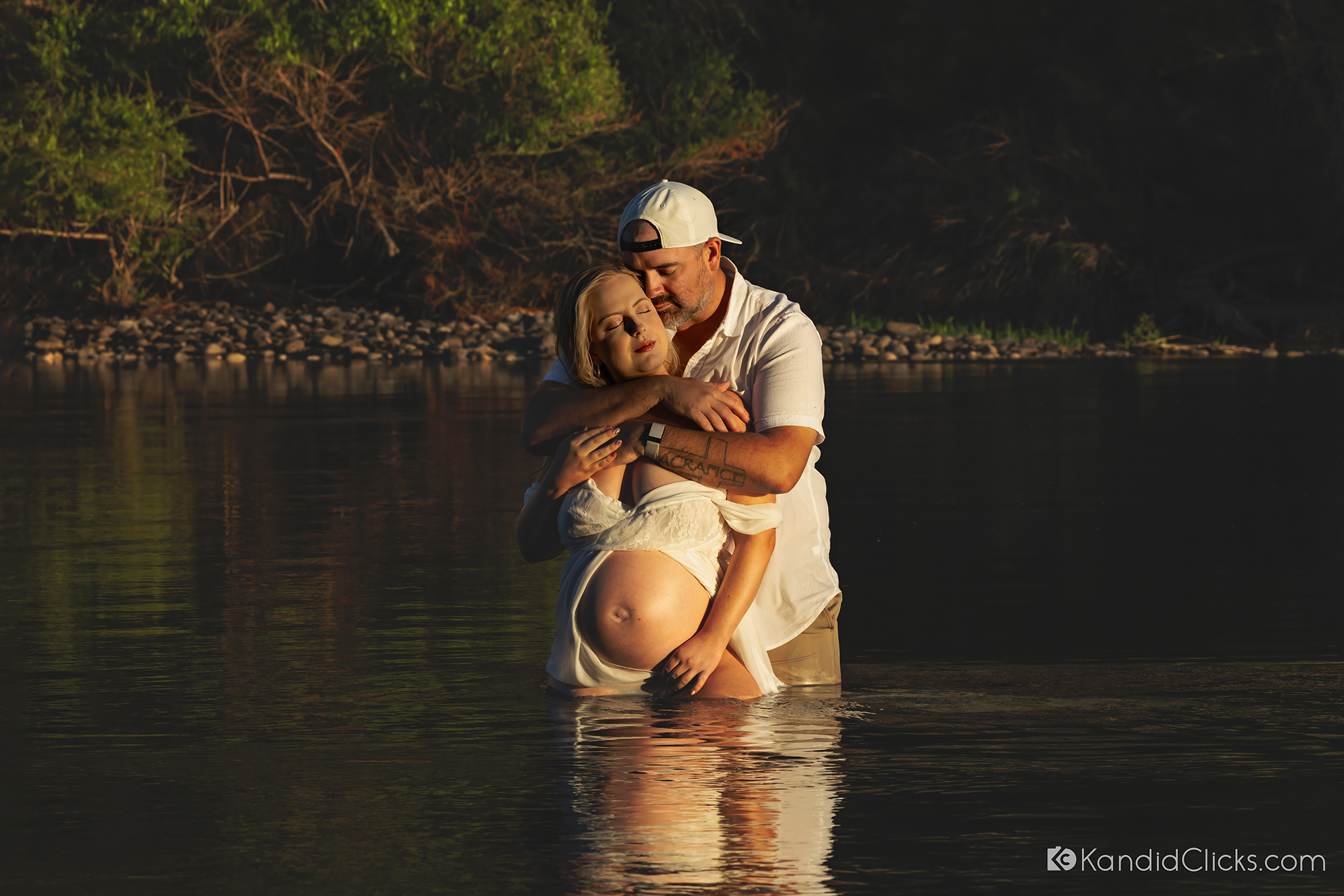 maternity photographer arizona river couple sunset